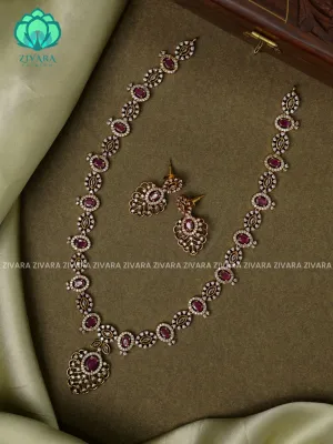 RUBY  - Motif free- Elegant and stylish gold polish MIDCHEST  haaram/neckwear with earrings- Zivara Fashion