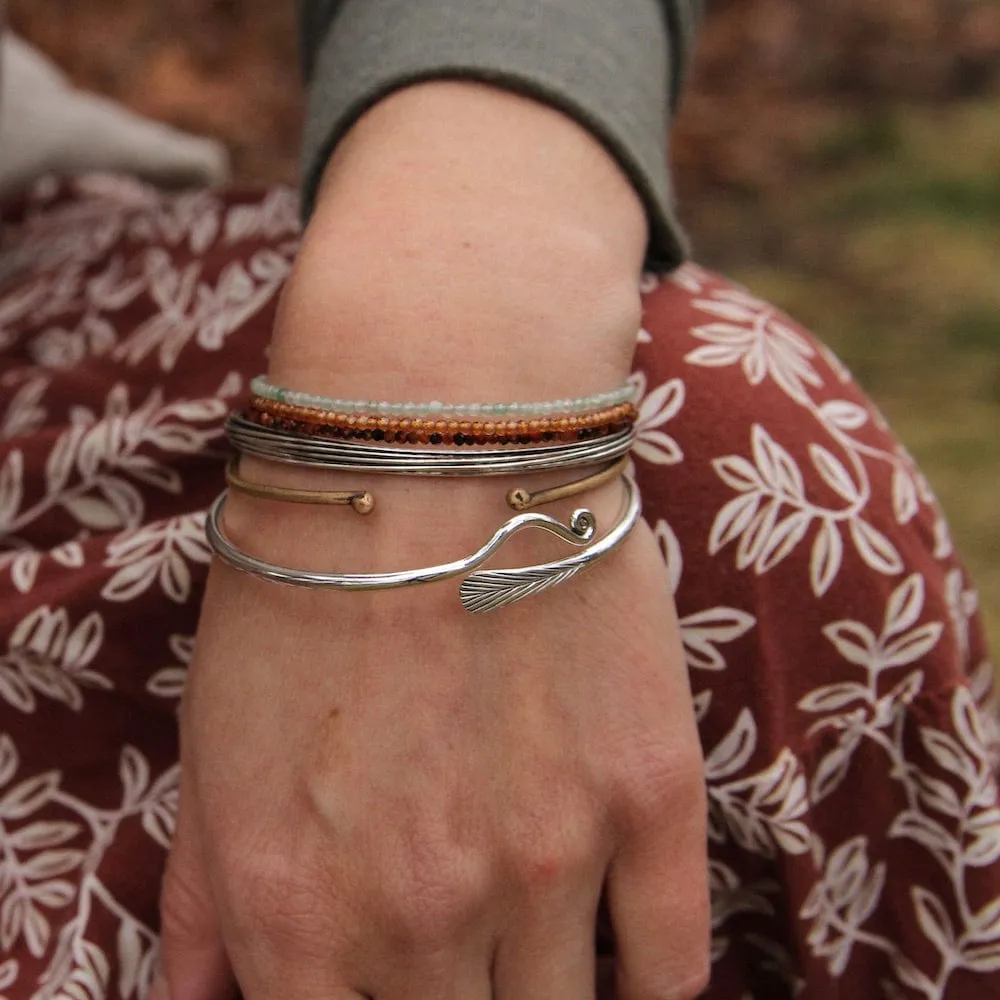 Wave with Coiled By-Pass Bangle